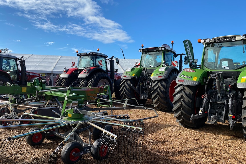 A line of shiny new tractors at AgFest