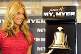 Supermodel Jennifer Hawkins rings a bell to announce the listing of Myer on the ASX.