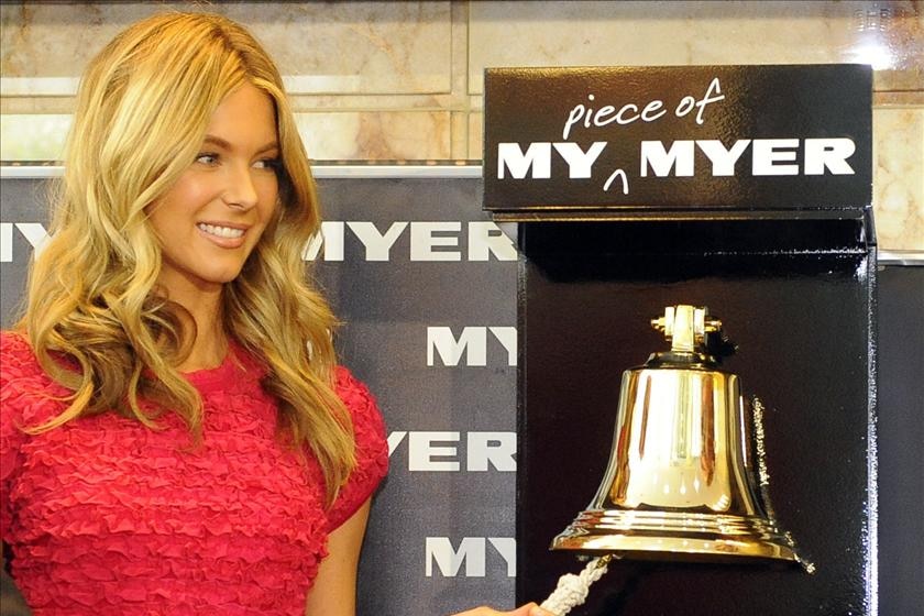Supermodel Jennifer Hawkins rings a bell to announce the listing of Myer on the ASX.