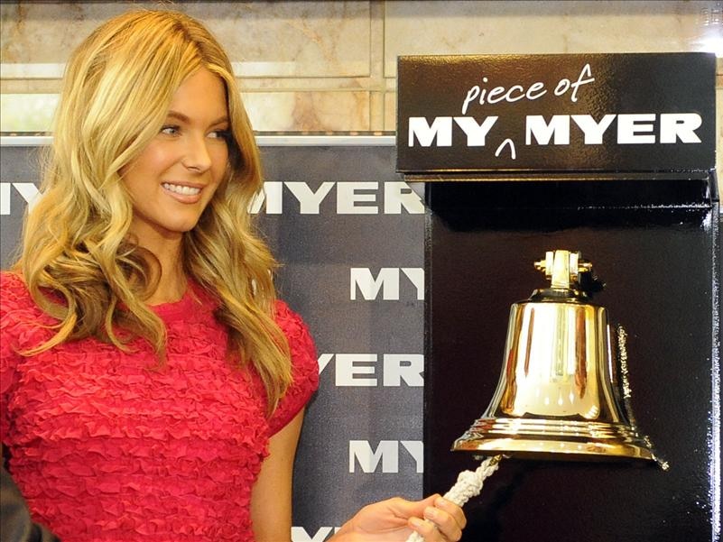 Supermodel Jennifer Hawkins rings a bell to announce the listing of Myer on the ASX.