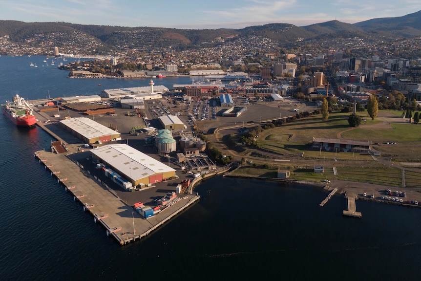 An aerial photo of the Macquarie Point precinct looking back towards the CBD and Mt Wellington. 