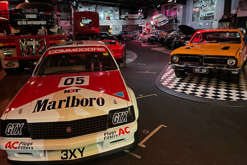 A Holden Commodore VK replica of the vehicle Australian race car driver Peter Brock drove sits in a collection.
