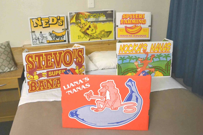 Collection of colourful boxes on motel bed