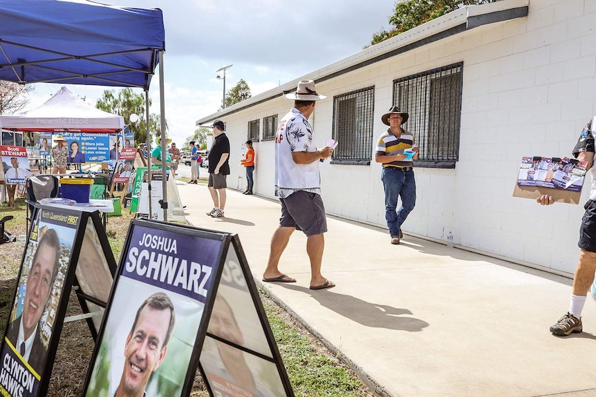Voters arrive at the polling booth at Brothers Townsville Football Club