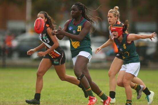 Loveth Ochayi in action for the Tasmanian Womens State Team (AFL)