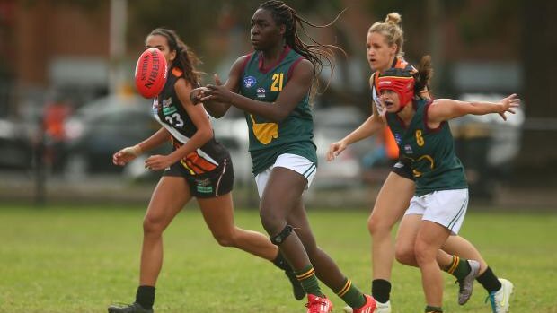 Loveth Ochayi in action for the Tasmanian Womens State Team (AFL)