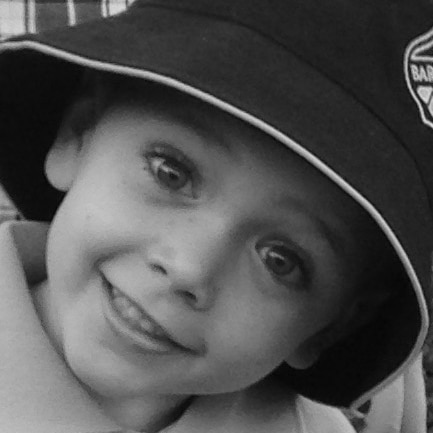 Black and white photo young boy