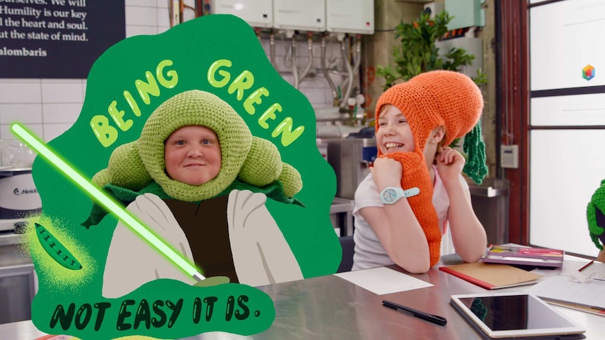 Teenage boy and girl wear vegetable costume hat, text bubble reads "Being green, not easy it is."