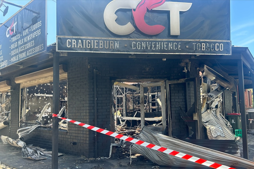 The front of Craigieburn Convenience Tobacco in daylight, with the interior completed burnt and destroyed.