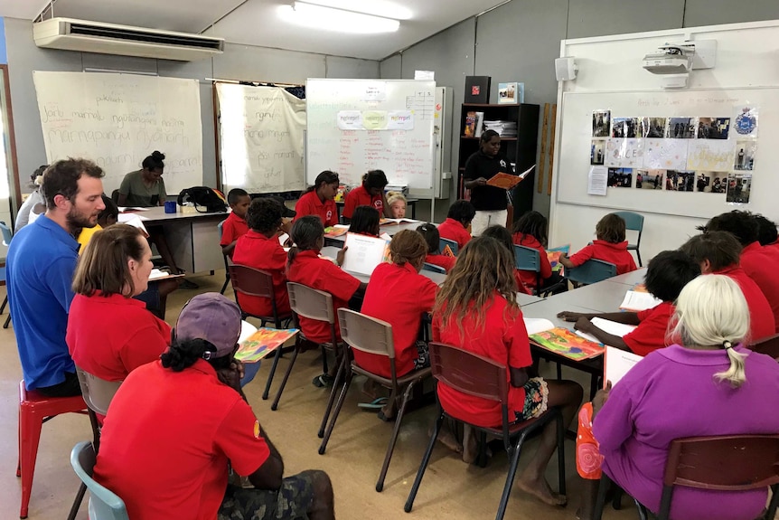 Students sit in a classroom