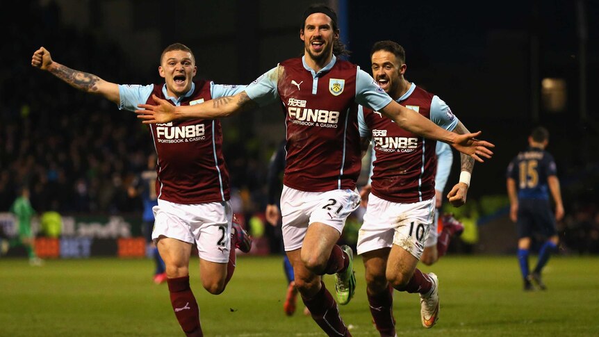 Burnley's George Boyd (C) celebrates a goal against Manchester City at Turf Moor.
