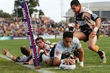 Jerome Ropati reaches out to score for the Warriors