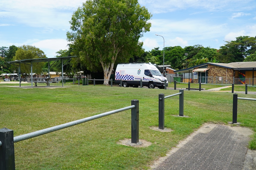 A police van parked by a park in Cairns