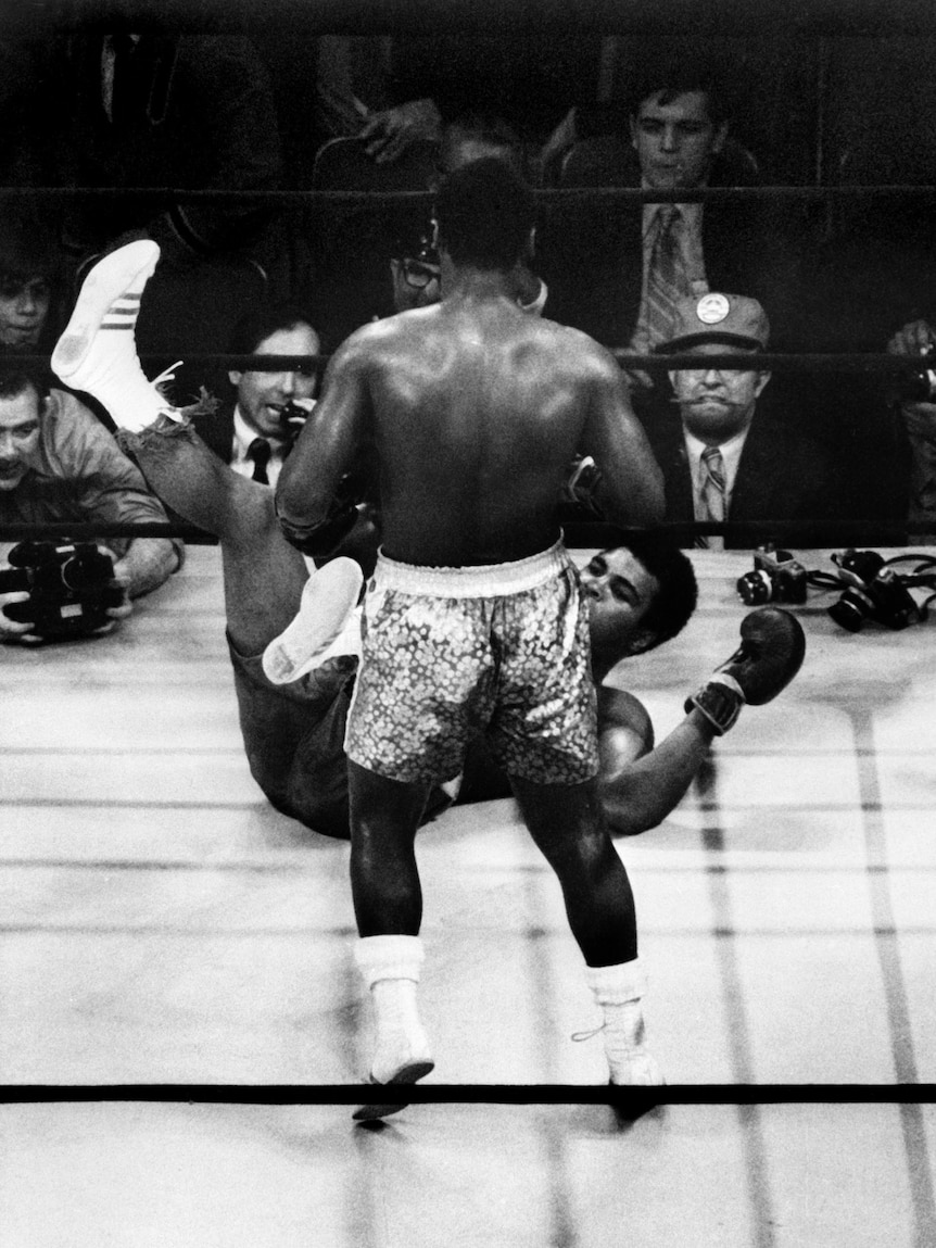 Frazier floors Ali in the fight known as the "match of the century" on March 8, 1971 at Madison Square Garden.