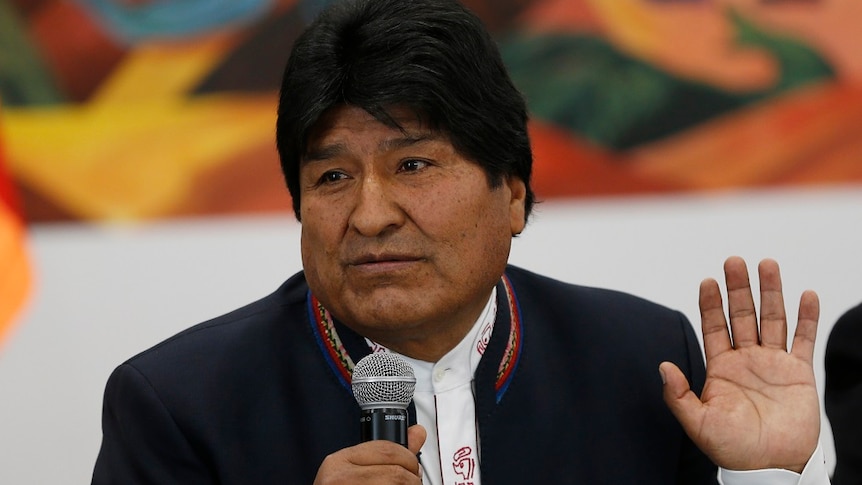 Bolivia's President Evo Morales speaking in a mic.