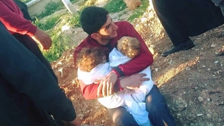 Syrian father buries 22 family members, twin children after suspected chemical attack