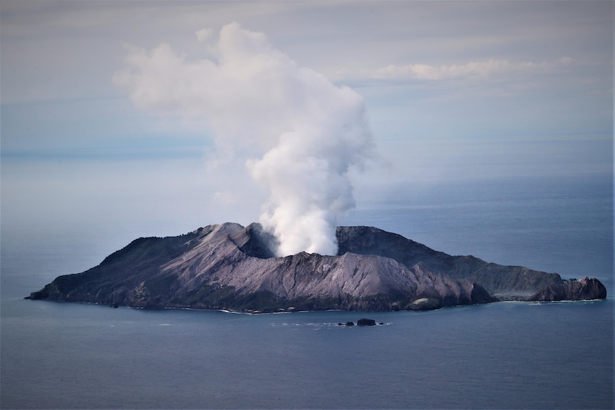 A steaming island volcano