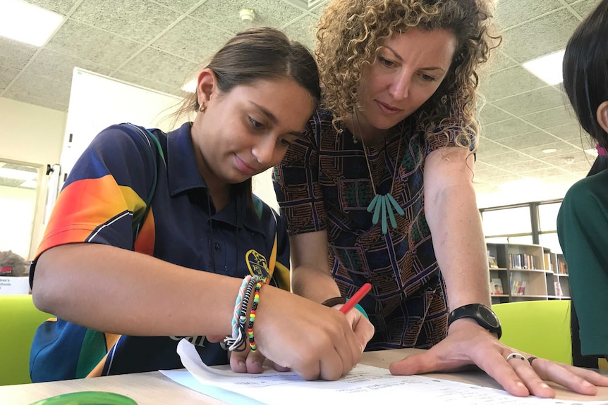 Johanna Bell with students at Darwin's Malak Primary School.