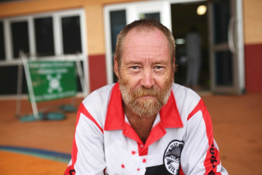 Kirk Morrison sitting inside the evacuation centre.