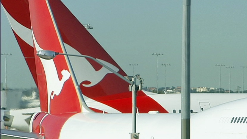 The tails of two Qantas planes