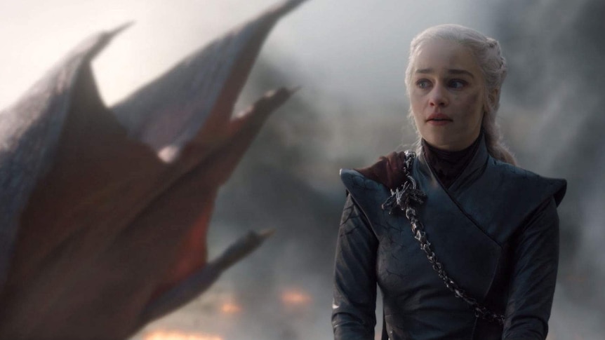 Daenerys sits atop her dragon looking across King's Landing.