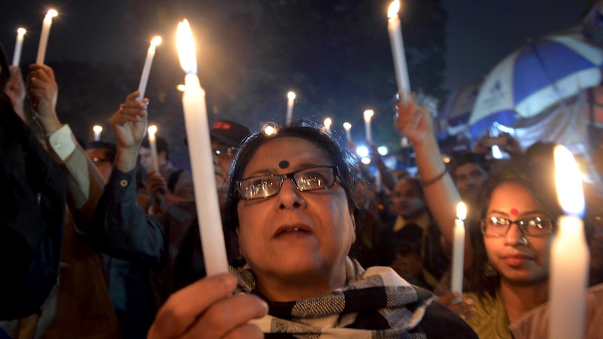 Protest in Kolkata, India, against the gang-rape and murder of a teenager.