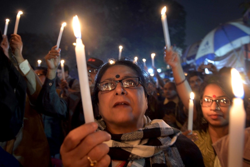 Protest in Kolkata, India, against the gang-rape and murder of a teenager.