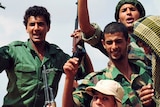 Key victory: anti-Gaddafi fighters celebrate in Sirte