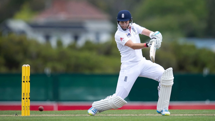 England's Joe Root plays a back foot shot against Australia A in Hobart.