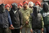 Indian police present six arrested men, accused of a gang rape in Punjab state.
