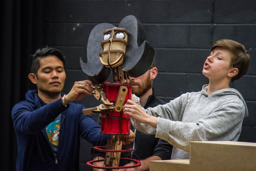 Up to three puppeteers can work at moving one puppet.