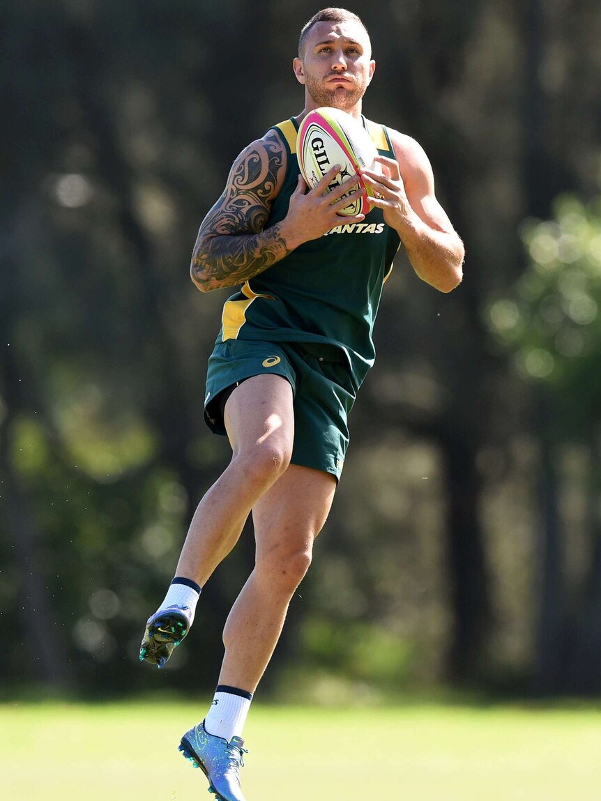 Tall order ... Quade Cooper takes part in an Australian sevens training session in Sydney