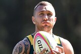 Tall order ... Quade Cooper takes part in an Australian sevens training session in Sydney