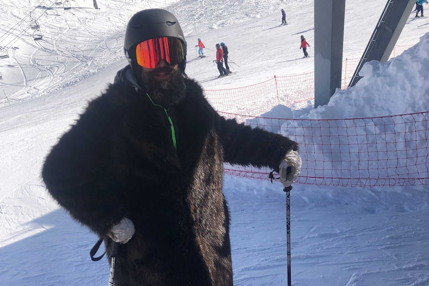 A skier wearing a fur coat at Mzaar ski resort near Beirut, Lebanon