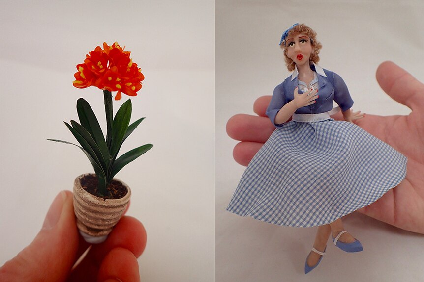 Composite of a hand holding a miniature pot plant and a doll.