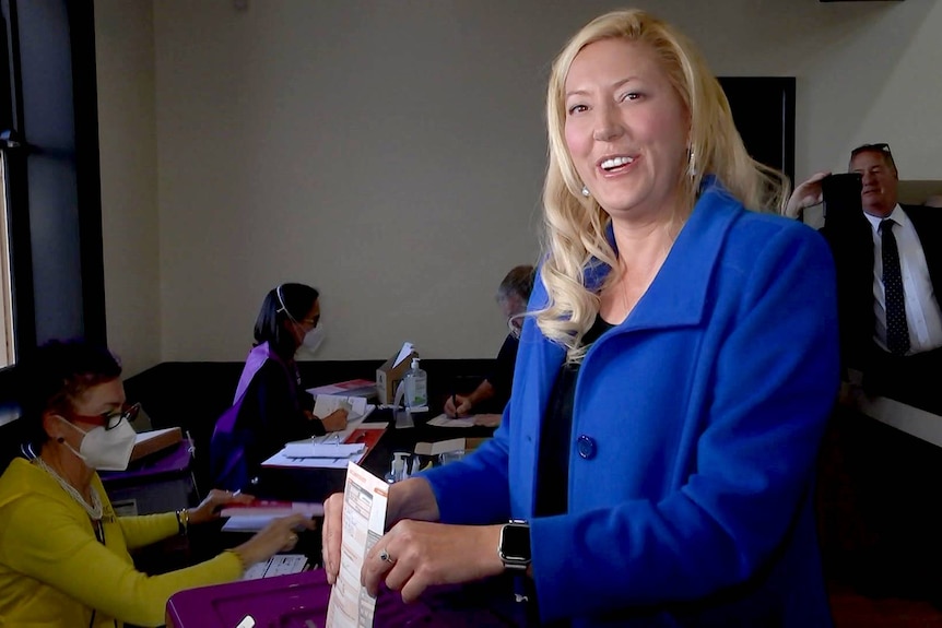 Liberal candidate Rachel Swift casts her ballot.