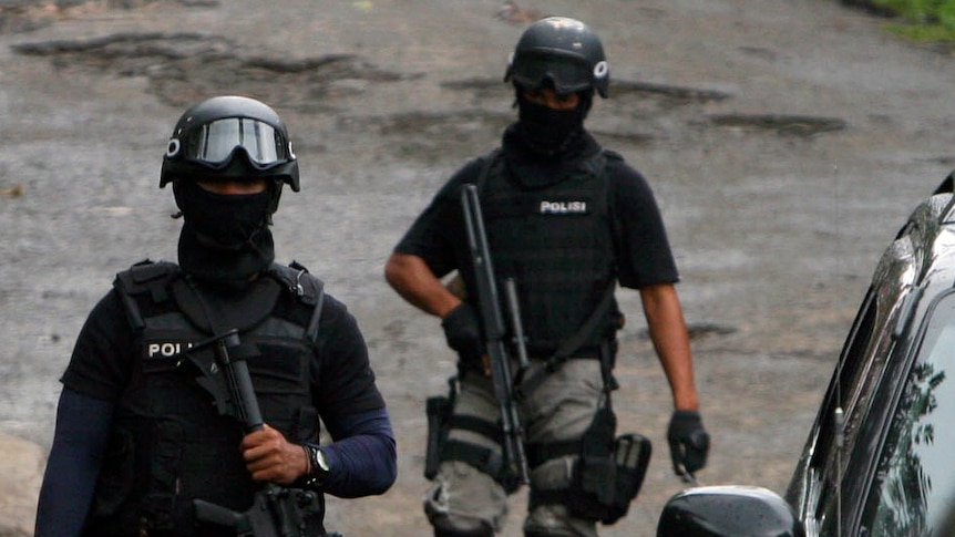 Policemen from Indonesua's Detachment 88 unit