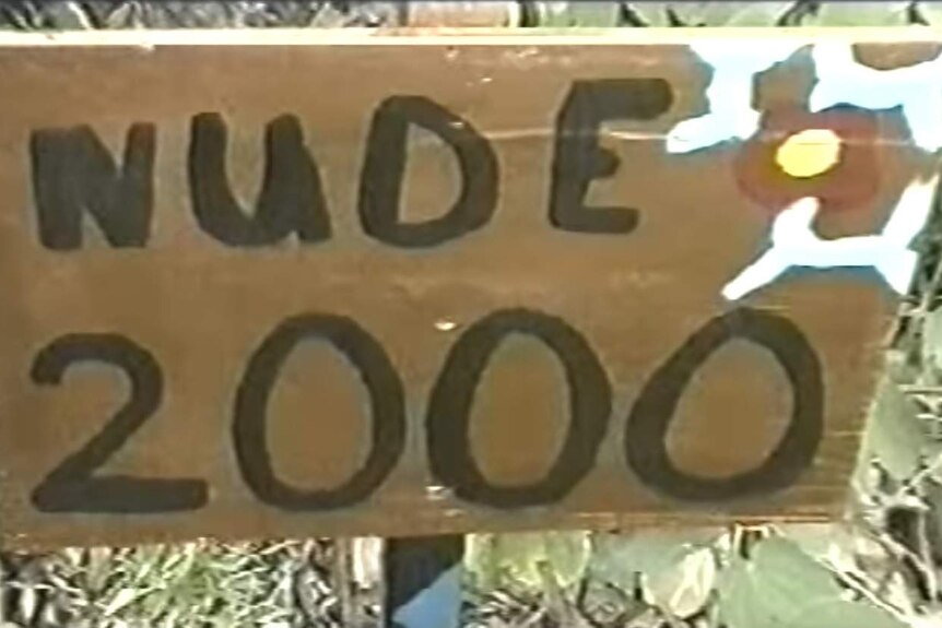 A sign saying 'nude 2000'