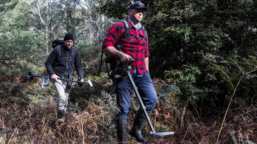 Levi Triffitt and Anton Botak are hunting for gold in remote Tasmanian bushland.