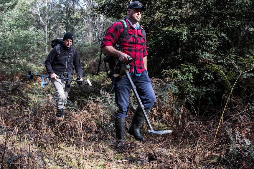 Levi Triffitt and Anton Botak are hunting for gold in remote Tasmanian bushland.