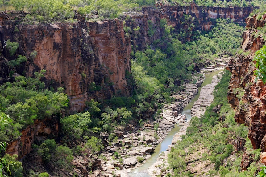 A stream runs through a large rocky gorge
