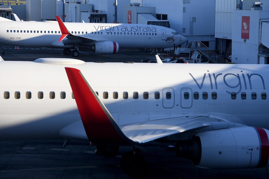 two virgin australia planes on the tarmac