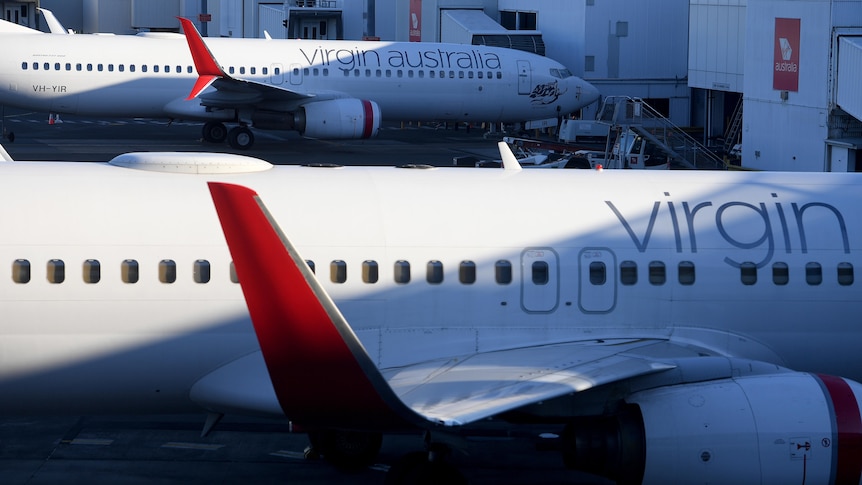 two virgin australia planes on the tarmac
