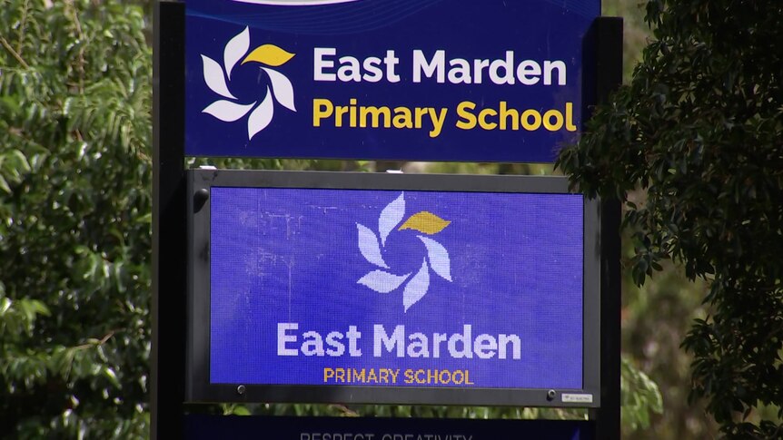 A sign saying East Marden Primary School