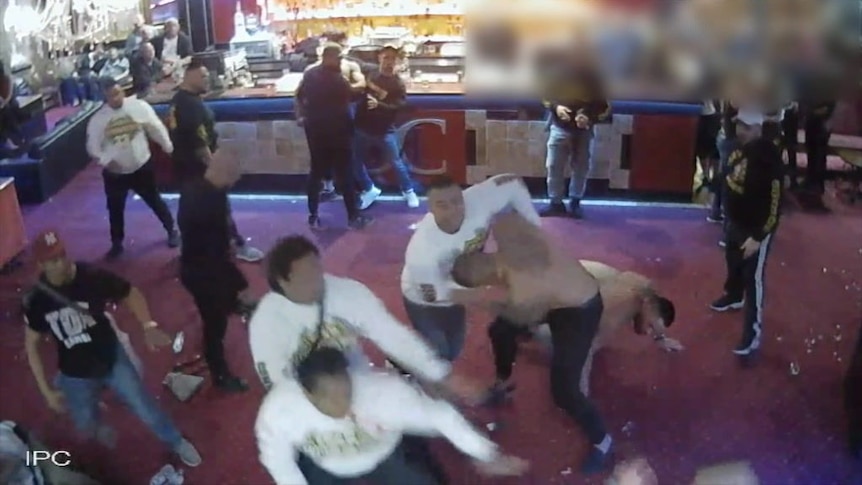 A still from CCTV footage showing a massive bikie brawl inside a Canberra strip club.