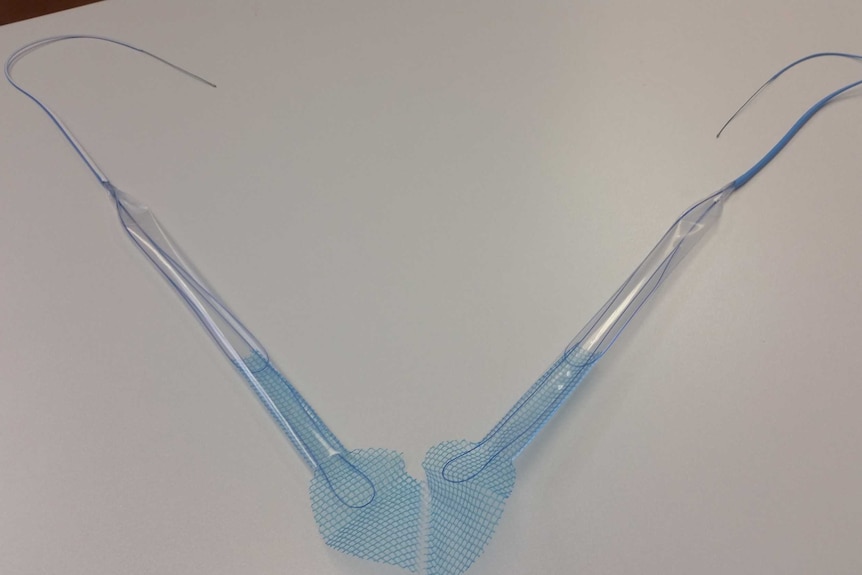 A vaginal mesh implant on a table.