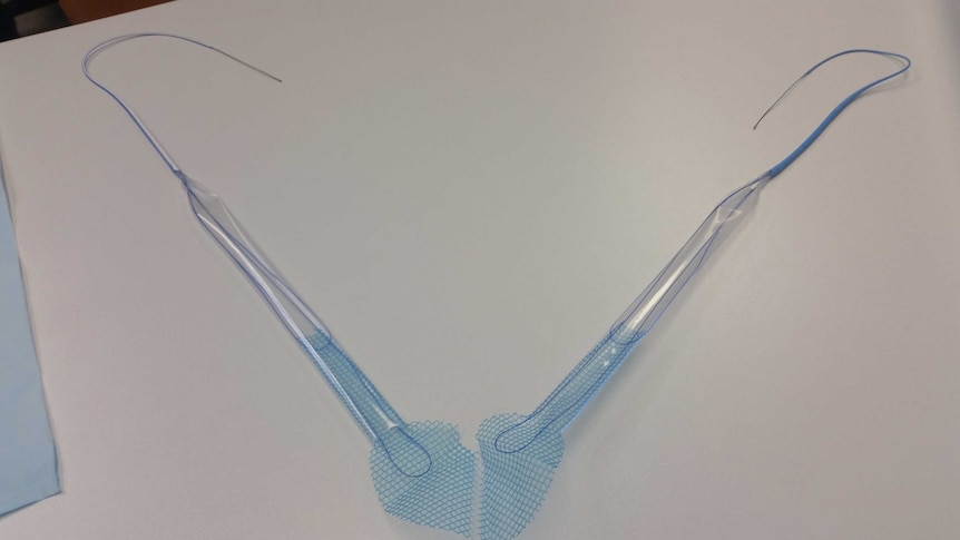 A vaginal mesh implant on a table.