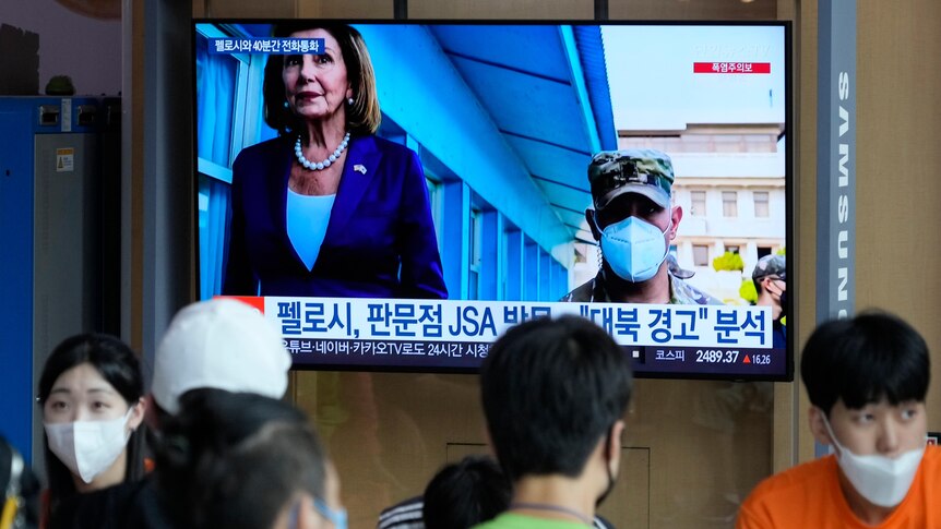 Television image of Nancy Pelosi at the Joint Security Area.