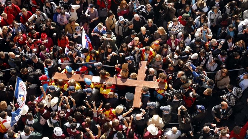 The World Youth Day cross is carried through the centre of Sydney.