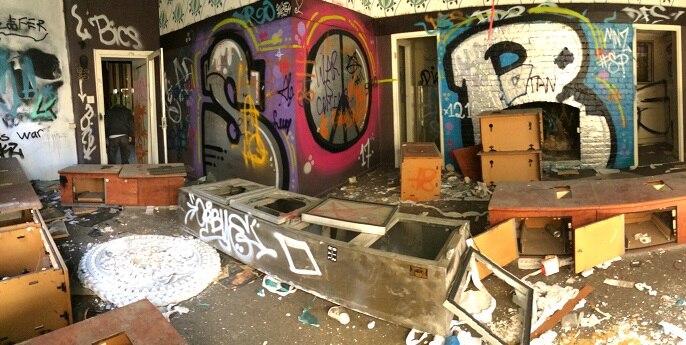 Debris and graffiti inside the Broadway Hotel, taken in July, 2018